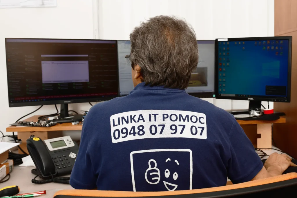 IT HELP technician managing corporate IT infrastructure at the office