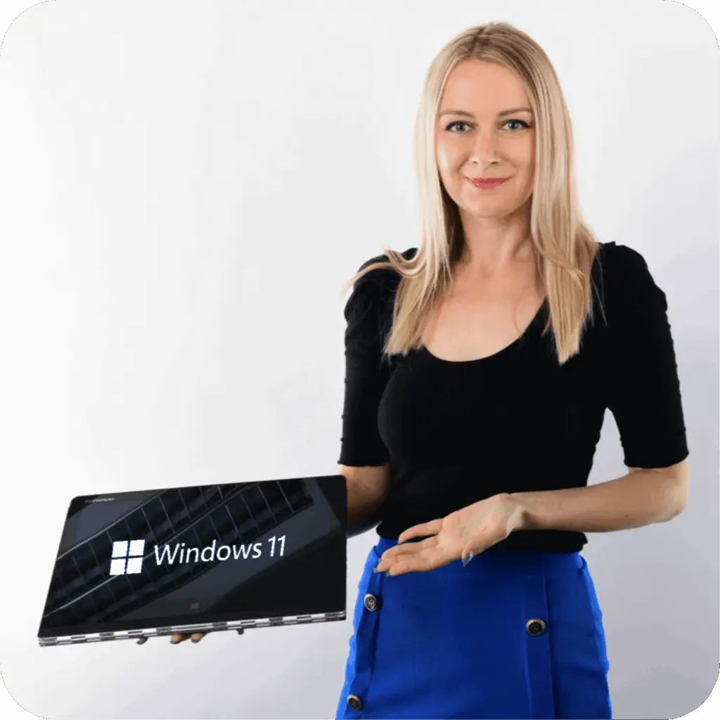 Female IT specialist with a laptop running Windows 11